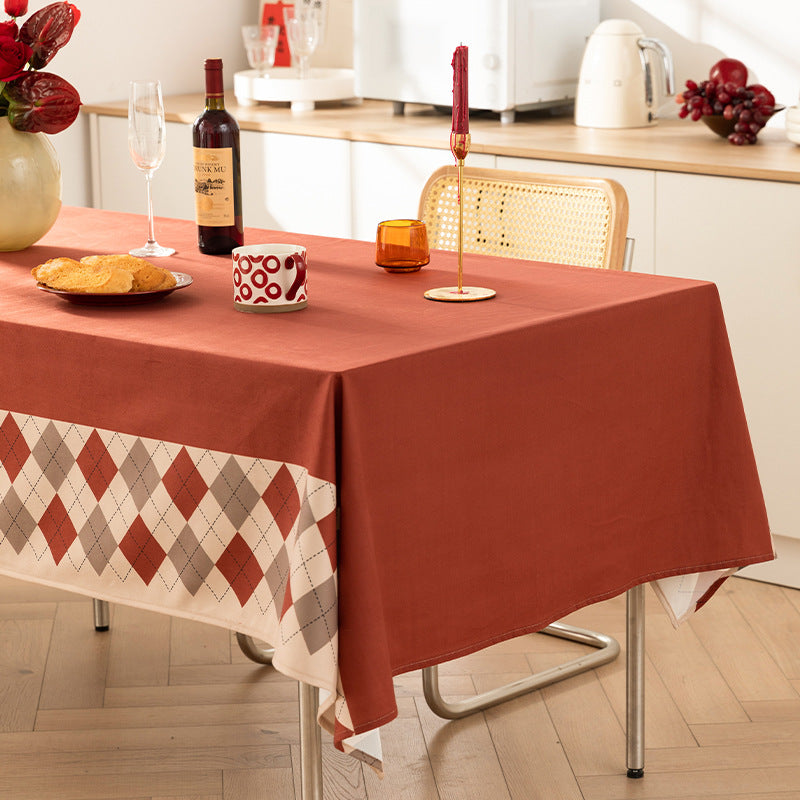 Printed rectangular tablecloth made of easy-care polyester with decorative hem border