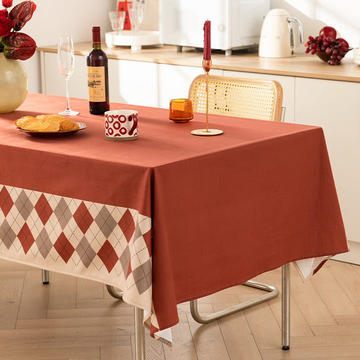 Printed rectangular tablecloth made of easy-care polyester with decorative hem border