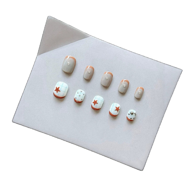 Artistic Press-On Nail Art Set with Star and Metallic Accents
