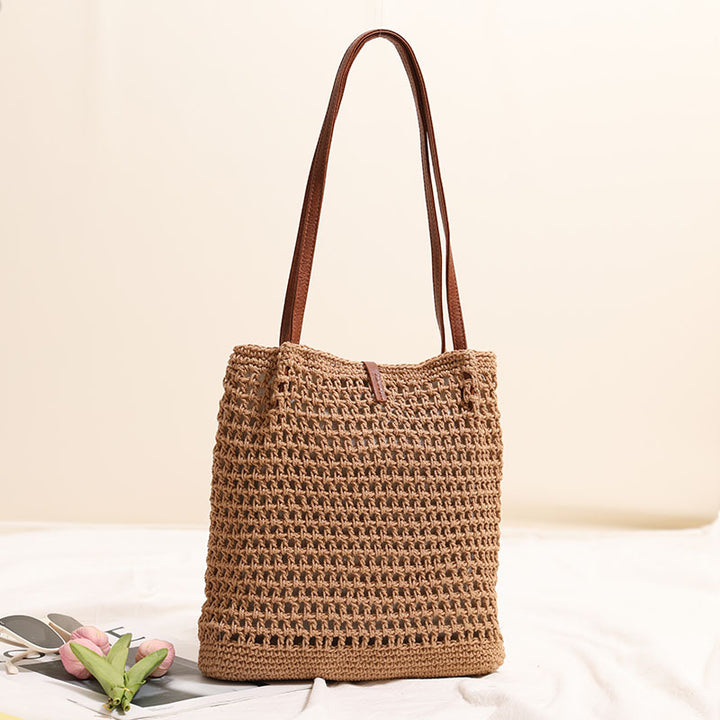 Hand-knotted basket bag with elegant leather handles Stornfield