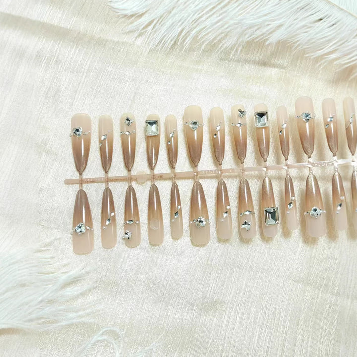 Artificial nails with sparkling rhinestone decorations Stornfield