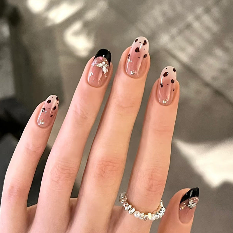 Artistic Press-On Nail Set with Floral and Rhinestone Accents Stornfield