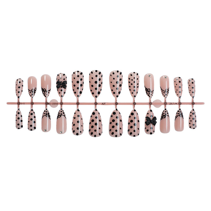 Artistic Press-On Nail Set with Polka Dot and Bow Designs Stornfield