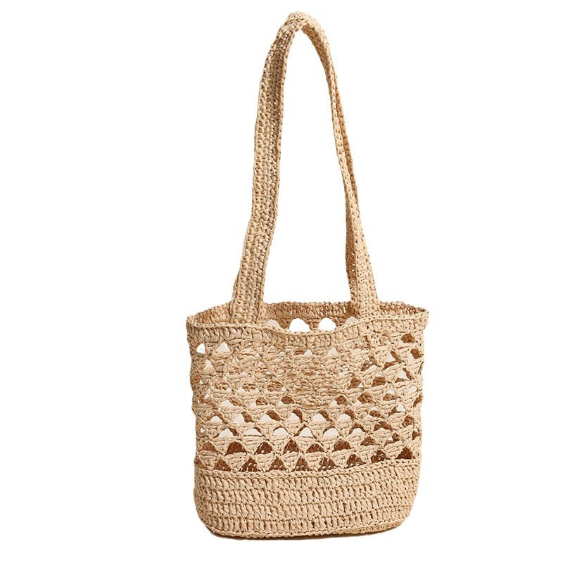 Handcrafted net straw bag with elegant straps Stornfield
