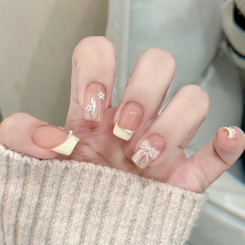 Artistic Nail Extensions with Decorative Elements Stornfield