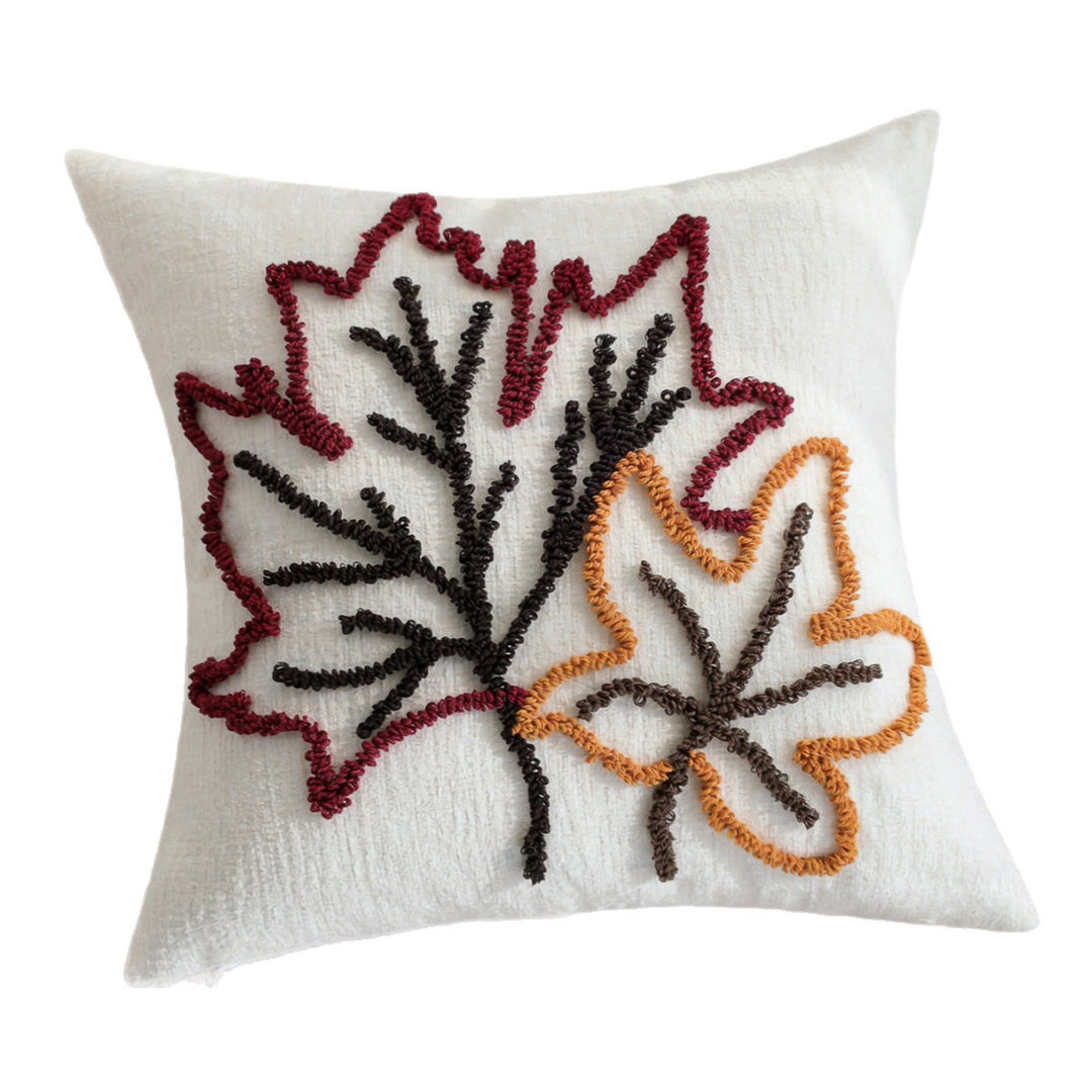 Decorative cushion with autumn leaf design