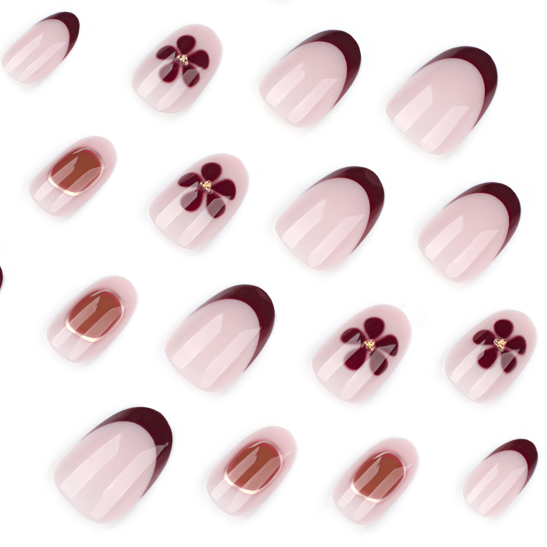 Elegant Nail Art with Floral Accents and Golden Details Stornfield