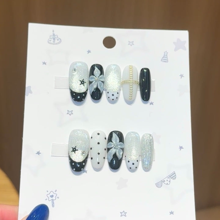 Glamorous artificial nail tips with floral accents Stornfield
