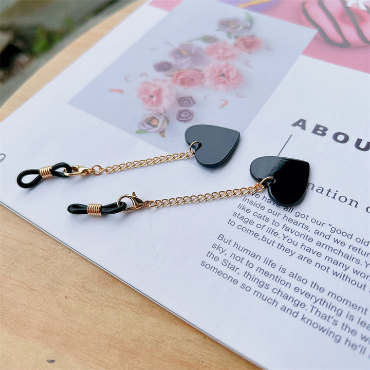 Heart-Shaped Dangle Earrings with Golden Chain Stornfield