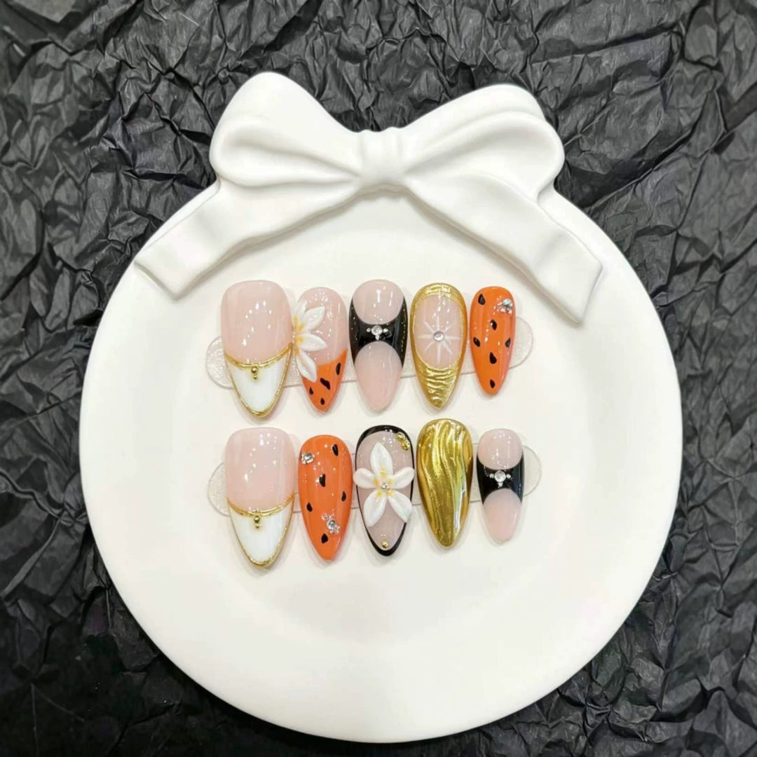 Decorative Press-On Nail Art Set with Floral and Metallic Accents