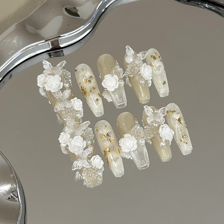 Elegant Press-On Nail Art Set with Floral and Pearl Accents