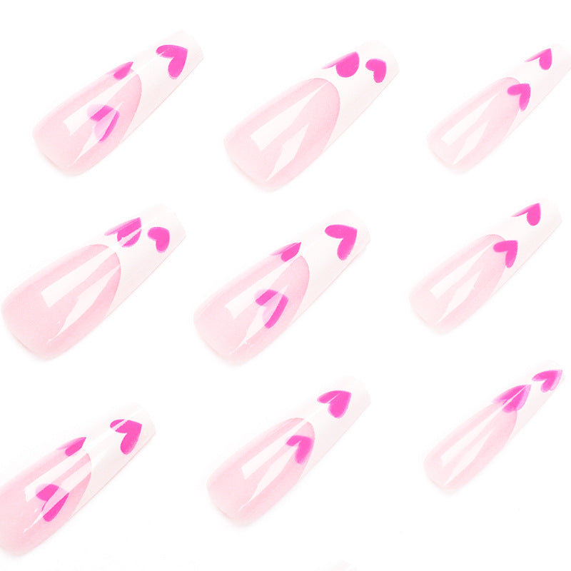 Artful Stiletto Nails with Hearts Design Stornfield