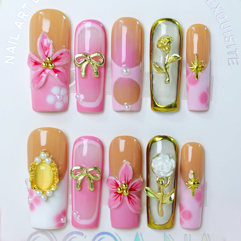 Artificial nail set with luxurious floral and glamorous decorations Stornfield