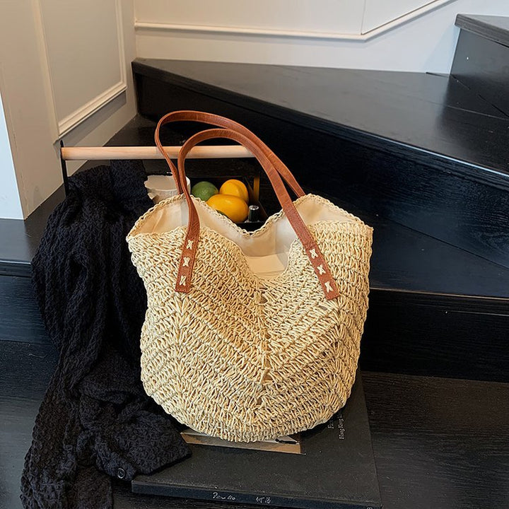 Elegant Bast shoulder bag with leather accents Stornfield