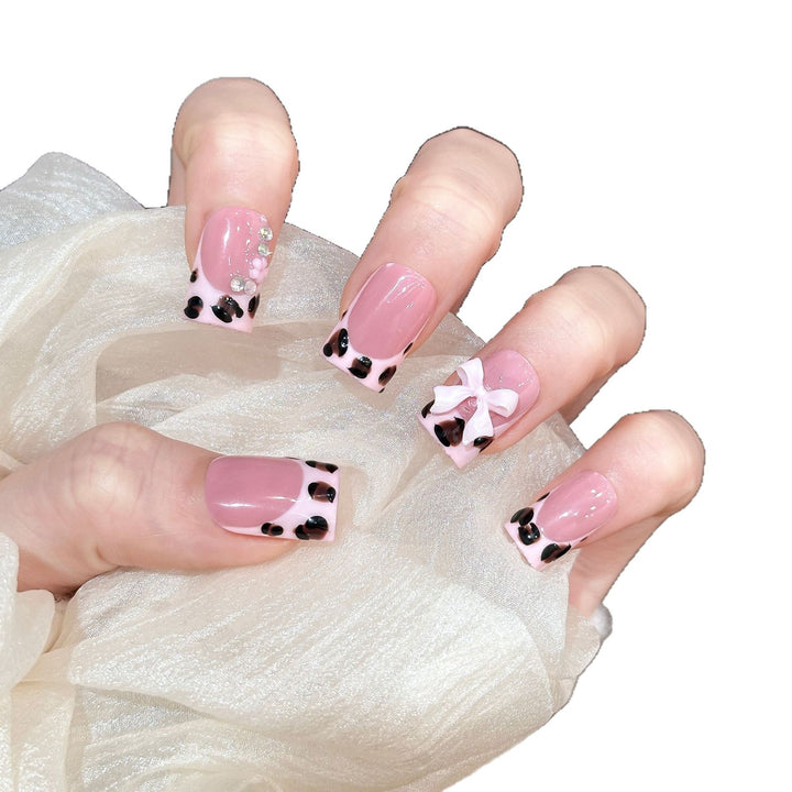 Decorative Press-On Nail Set with Unique Bow and Gem Accents