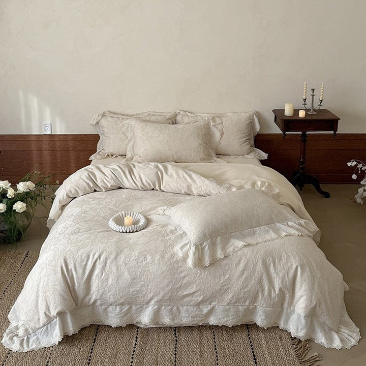 Jacquard bedding set with floral relief pattern and lace border