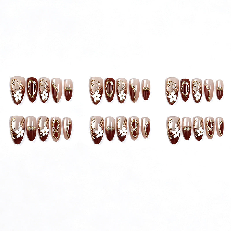 Artistic Press-On Nail Set with Floral and Metallic Accents Stornfield