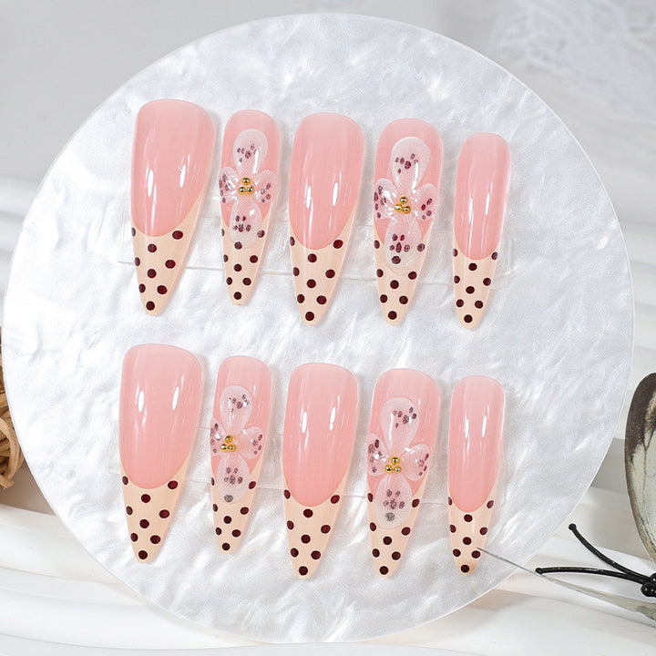 Art nail set with elegant flower and dot designs Stornfield