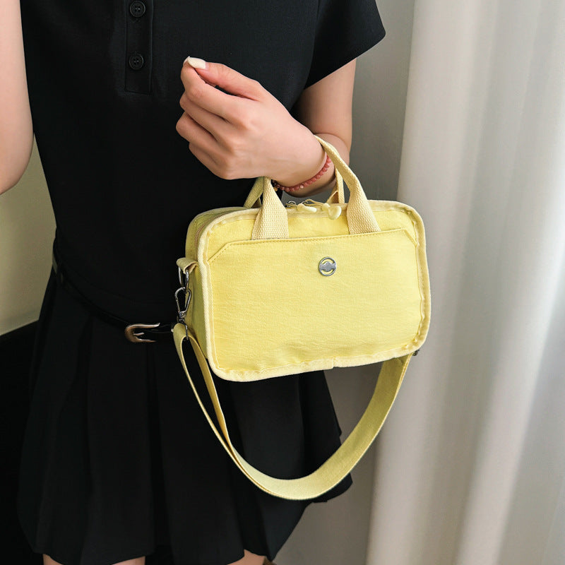 Tote bag with adjustable shoulder strap and extra storage Stornfield