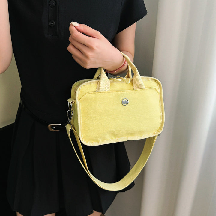 Tote bag with adjustable shoulder strap and extra storage Stornfield