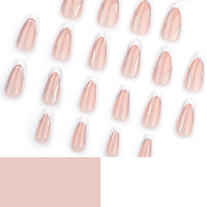 Elegant artificial nails with fine wave and glitter motifs Stornfield