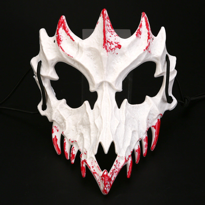 Half-face mask with flashing vampire teeth and adjustable rubber band