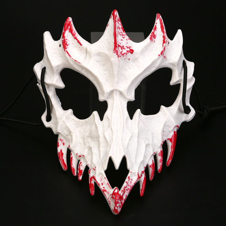 Half-face mask with flashing vampire teeth and adjustable rubber band