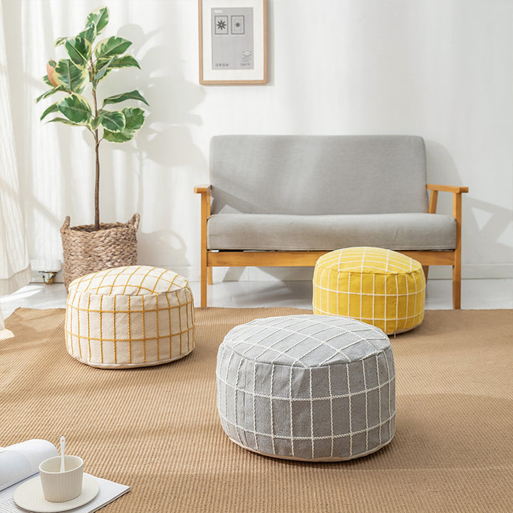 Beef padded seat pouf with embroidered check pattern and cotton cover