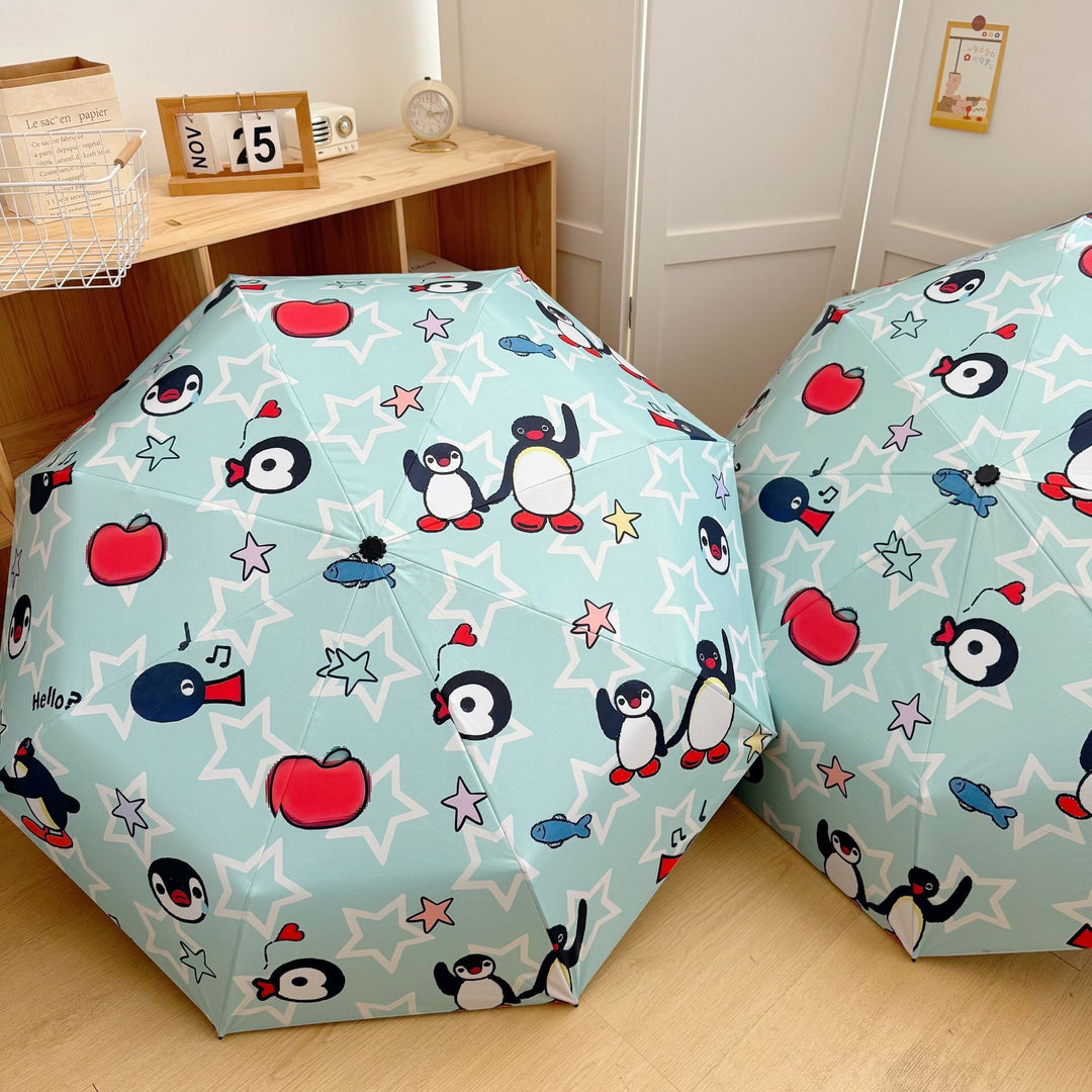 Ladies collapsible umbrella with playful penguin design Stornfield