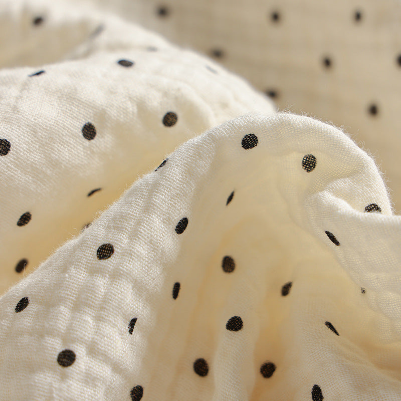 Long decorative storage roll with gathered ruffle hem and polka dot pattern Stornfield