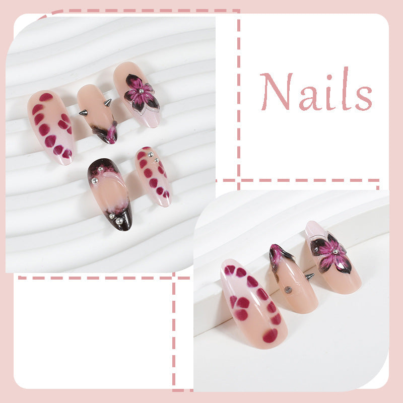 Acrylic nail set with elegant floral design and glossy accents Stornfield