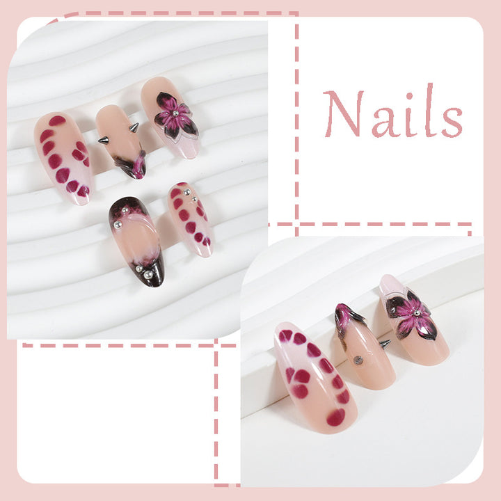 Acrylic nail set with elegant floral design and glossy accents Stornfield
