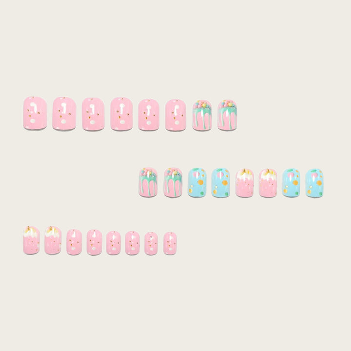Artificial nails with playful cupcake design Stornfield
