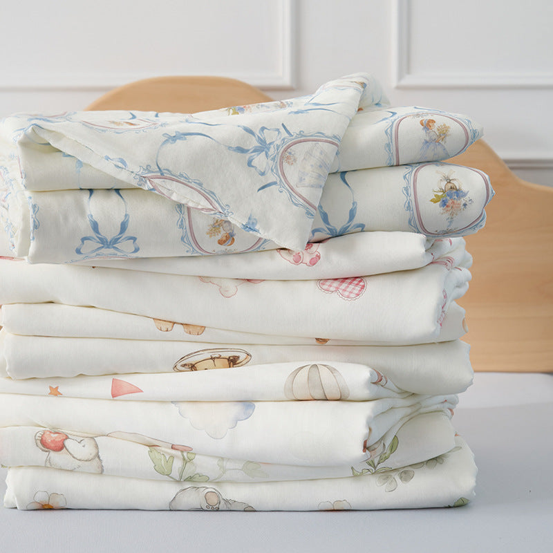 Double-layer muslin baby blanket with cute strawberry and bear motif