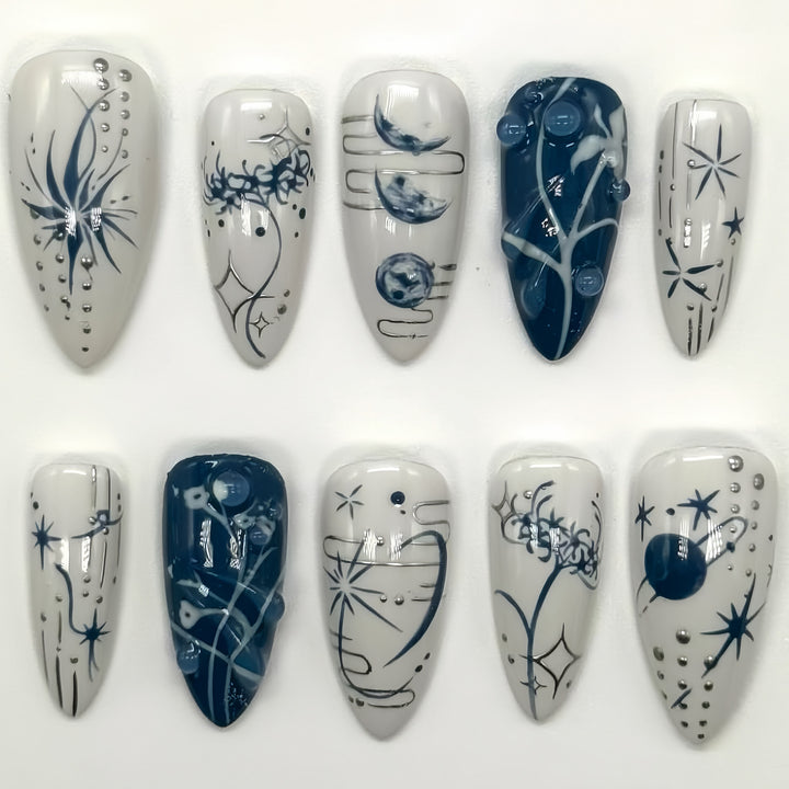 Artistic Long Stiletto Press-On Nails with Decorative Accents Stornfield