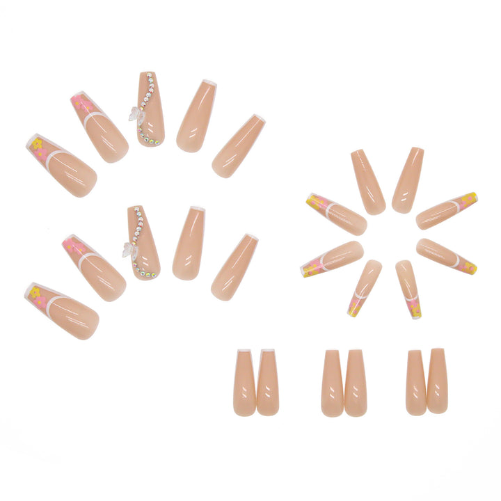 Artificail nail tips in elegant French design with floral accent Stornfield