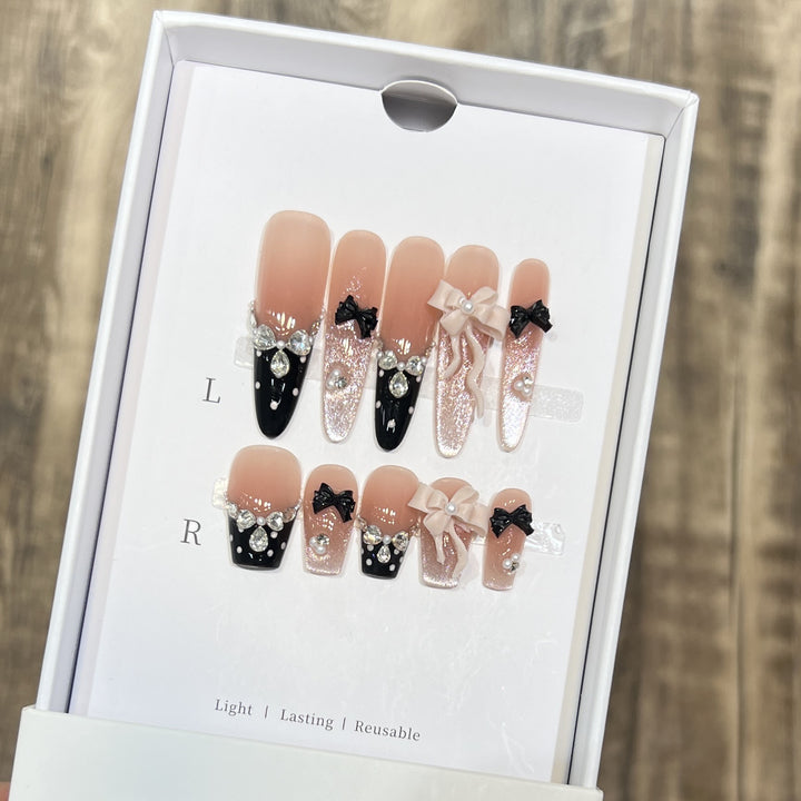Glamorous Stiletto Press-On Nail Set with Decorative Bow and Gemstone Accents Stornfield