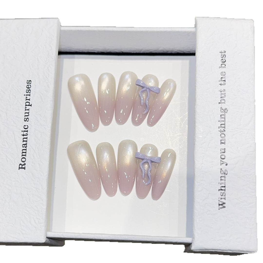 Artificial nails with romantic design and shimmering accents Stornfield