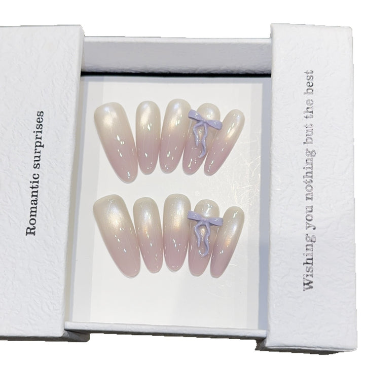 Artificial nails with romantic design and shimmering accents Stornfield