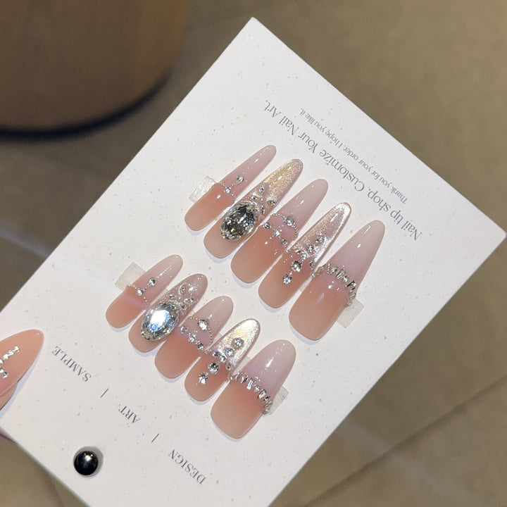 Artificial nails with elegant crystal decorations Stornfield