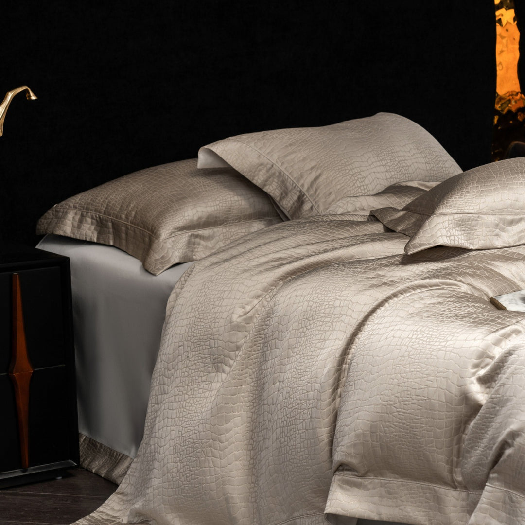 Luxurious satin bedding set with structured crocodile embossing and hotel closure