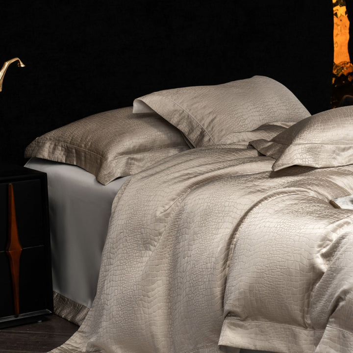 Luxurious satin bedding set with structured crocodile embossing and hotel closure