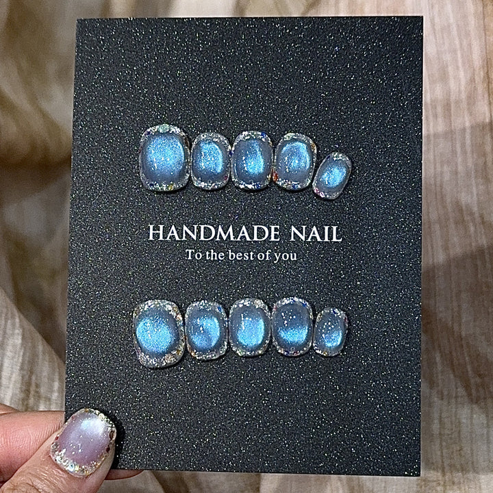 Handmade art nails with shimmering effects Stornfield