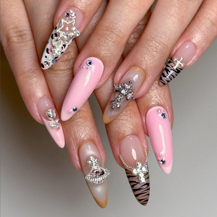 Artful stiletto nails with glitter and rhinestone embellishments Stornfield