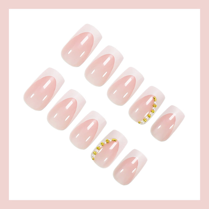 Artificial nail set with elegant French tips and glitter accents Stornfield