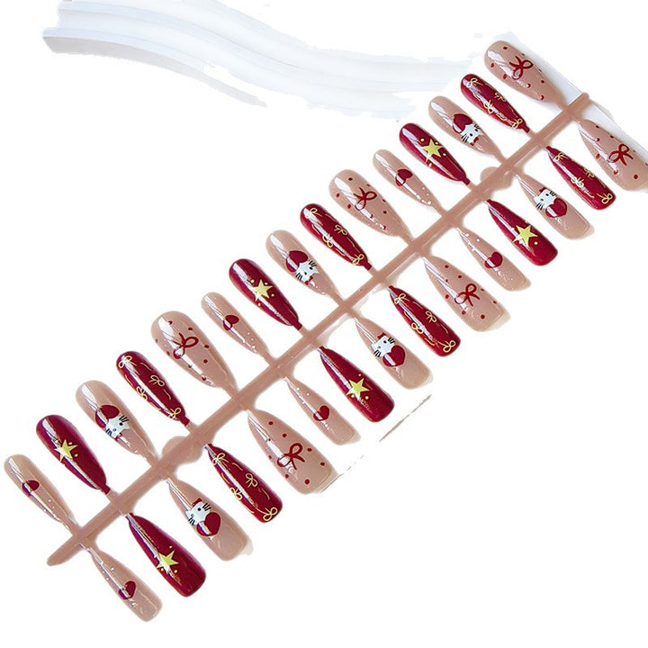 Artificial nails in festive Christmas design Stornfield