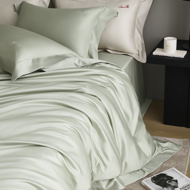 Bedding set made of fine satin with a silky-smooth finish and embroidered logo