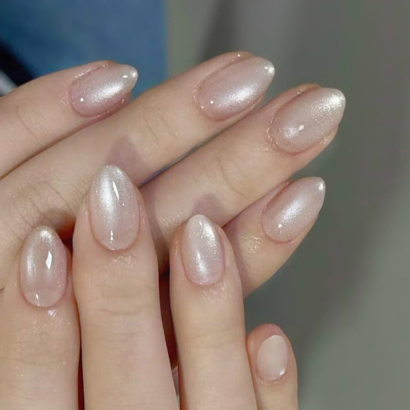 Artistic Glittered Almond-Shaped Nail Extensions Stornfield