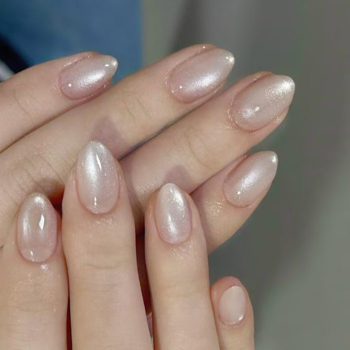 Artistic Glittered Almond-Shaped Nail Extensions Stornfield