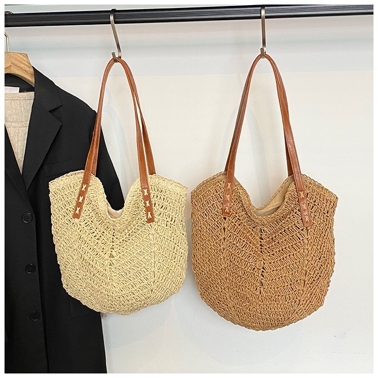 Elegant Bast shoulder bag with leather accents Stornfield